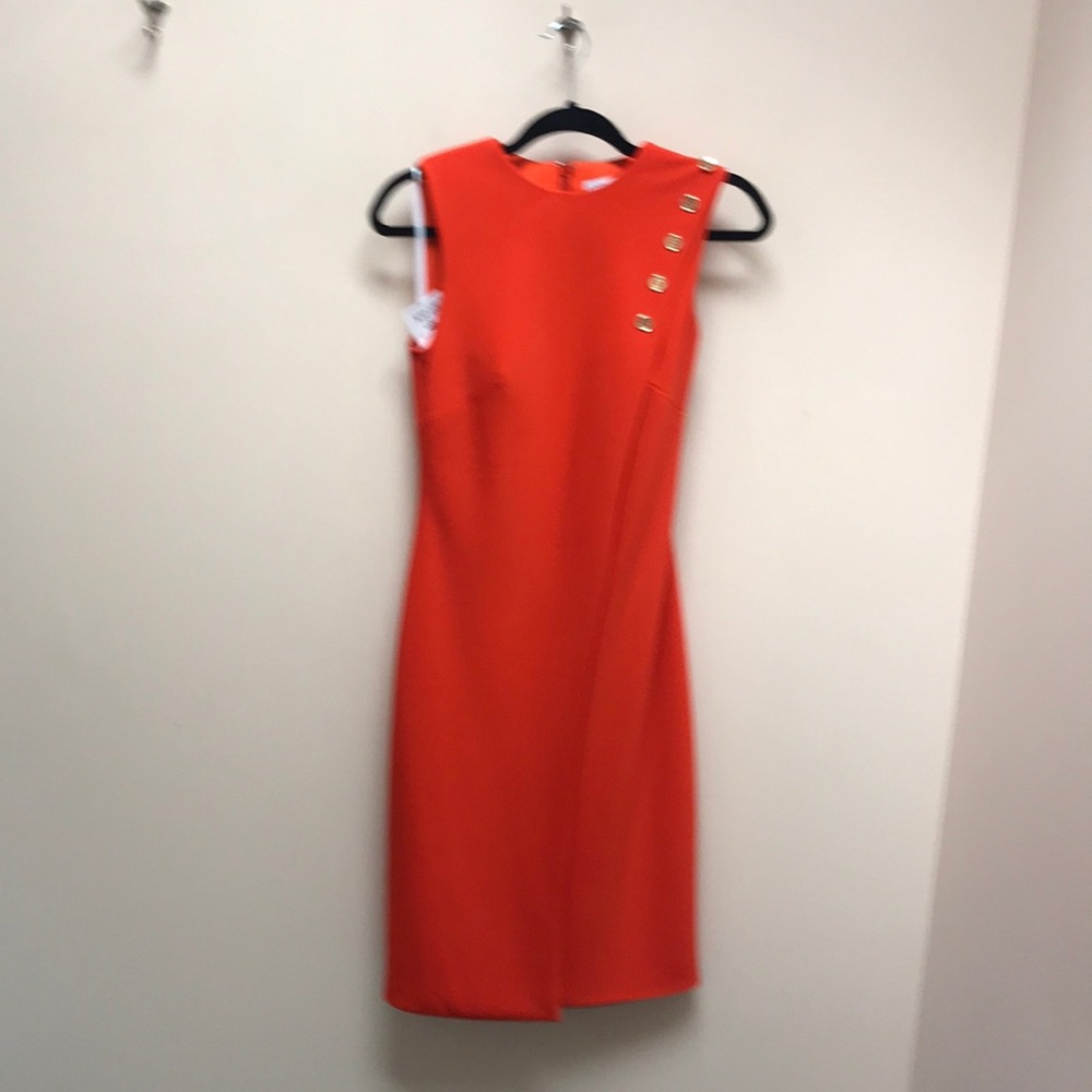 Ieena Macduggal bright orange interview dress